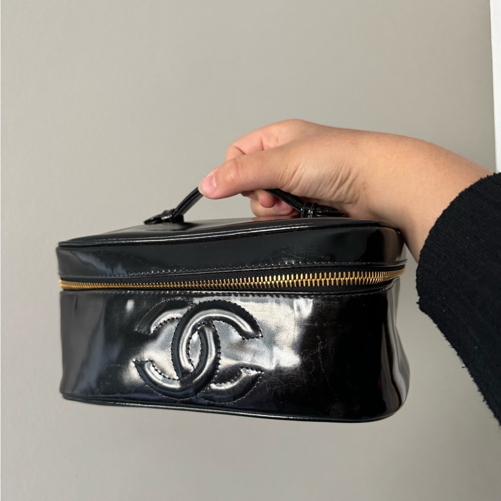 CHANEL Black Vanity Bag with Gold Accents